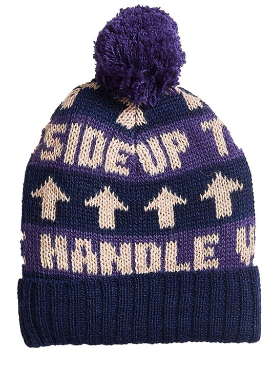 HANDLE WITH CARE POM POM HAT, INDIGO